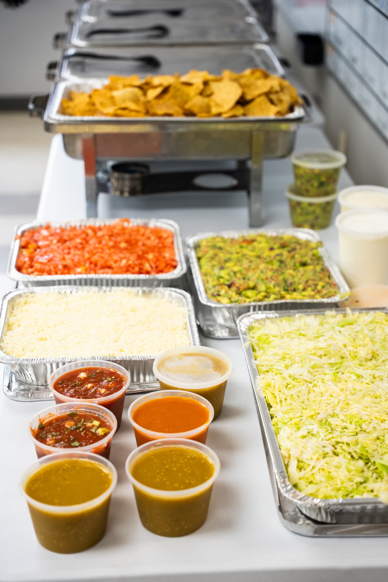 Taco Dale chips and salsa beside a selection of eligible dessert rewards